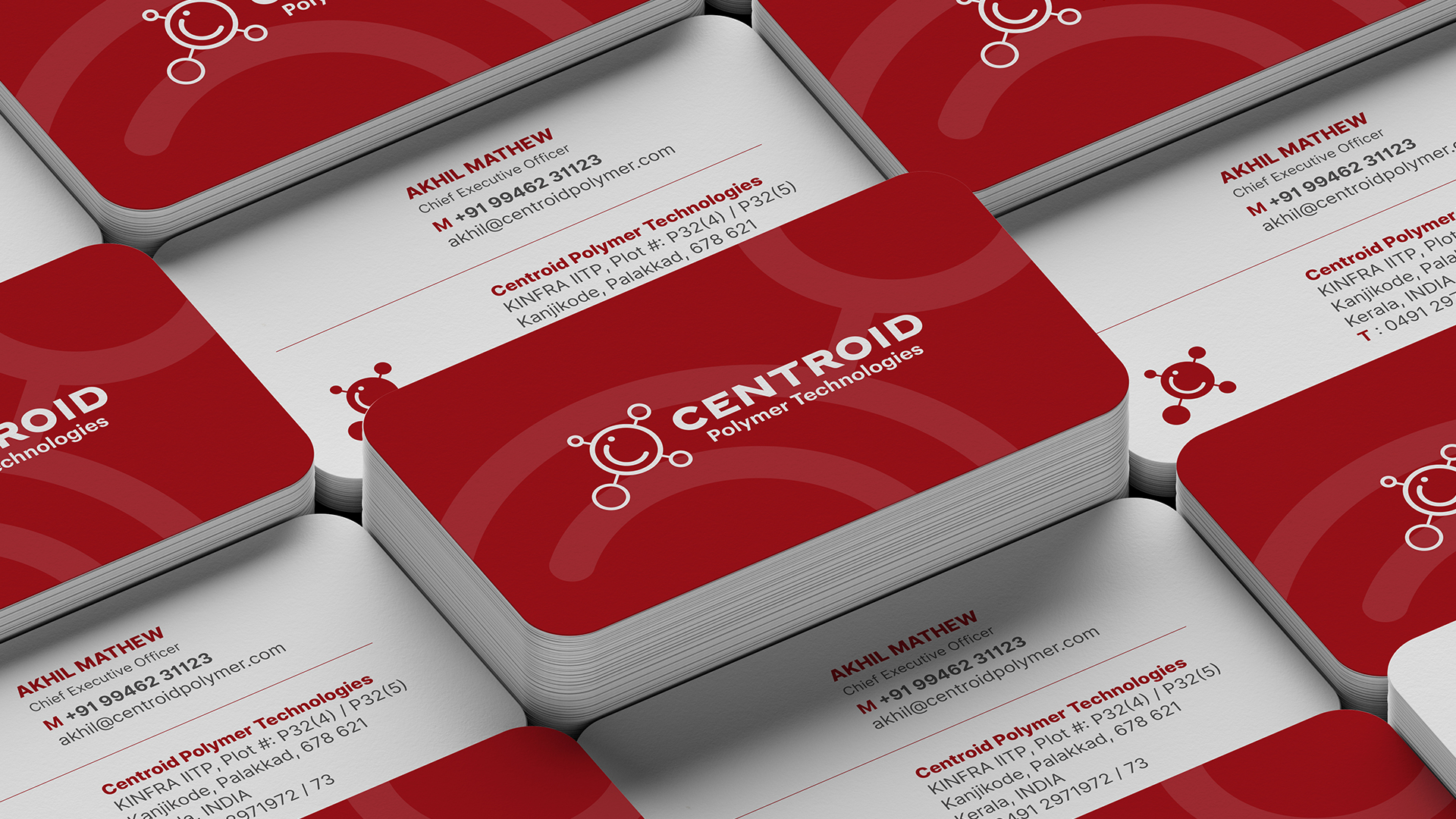 Stacked Centroid Polymer Technologies business cards featuring the red logo, contact details, and professional design, showcasing the branding